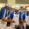 Rugby players taking part in chef course Scotland at The Edinburgh New Town Cookery School