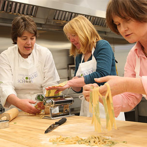 Learning how to make food from scratch during cookery class at culinary school Edinburgh